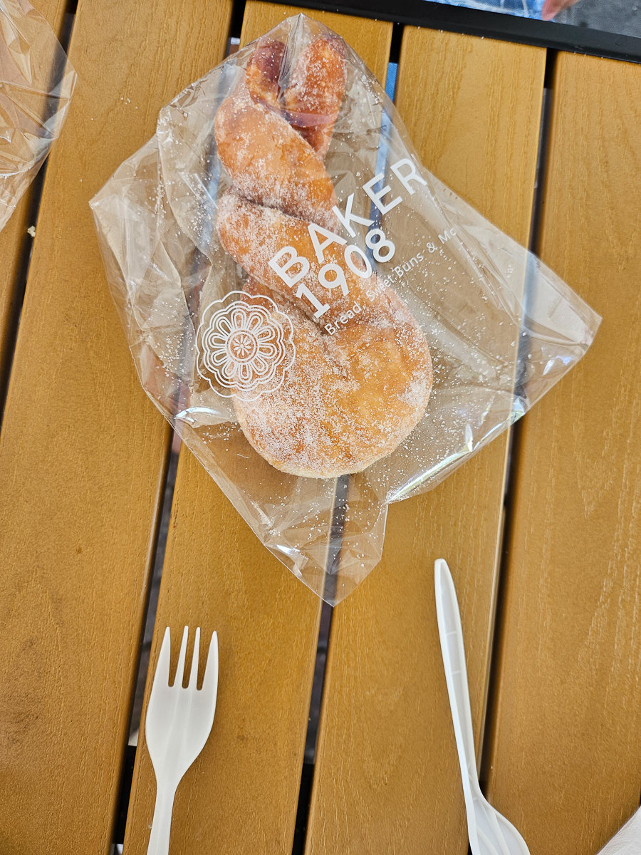 braid twist pastry in a plastic packaging with silverware